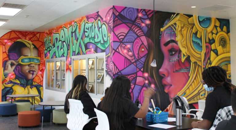 Leon Rainbow paints Trenton’s story on a larger canvas